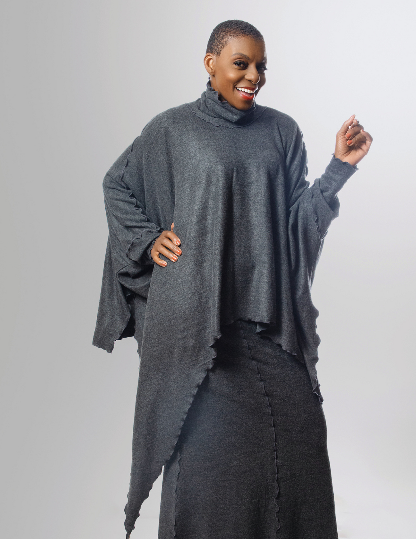 Dramatic dropside turtleneck tunic