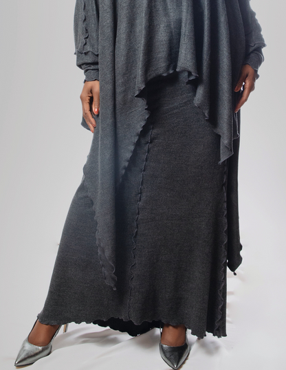 Dramatic kick hem skirt